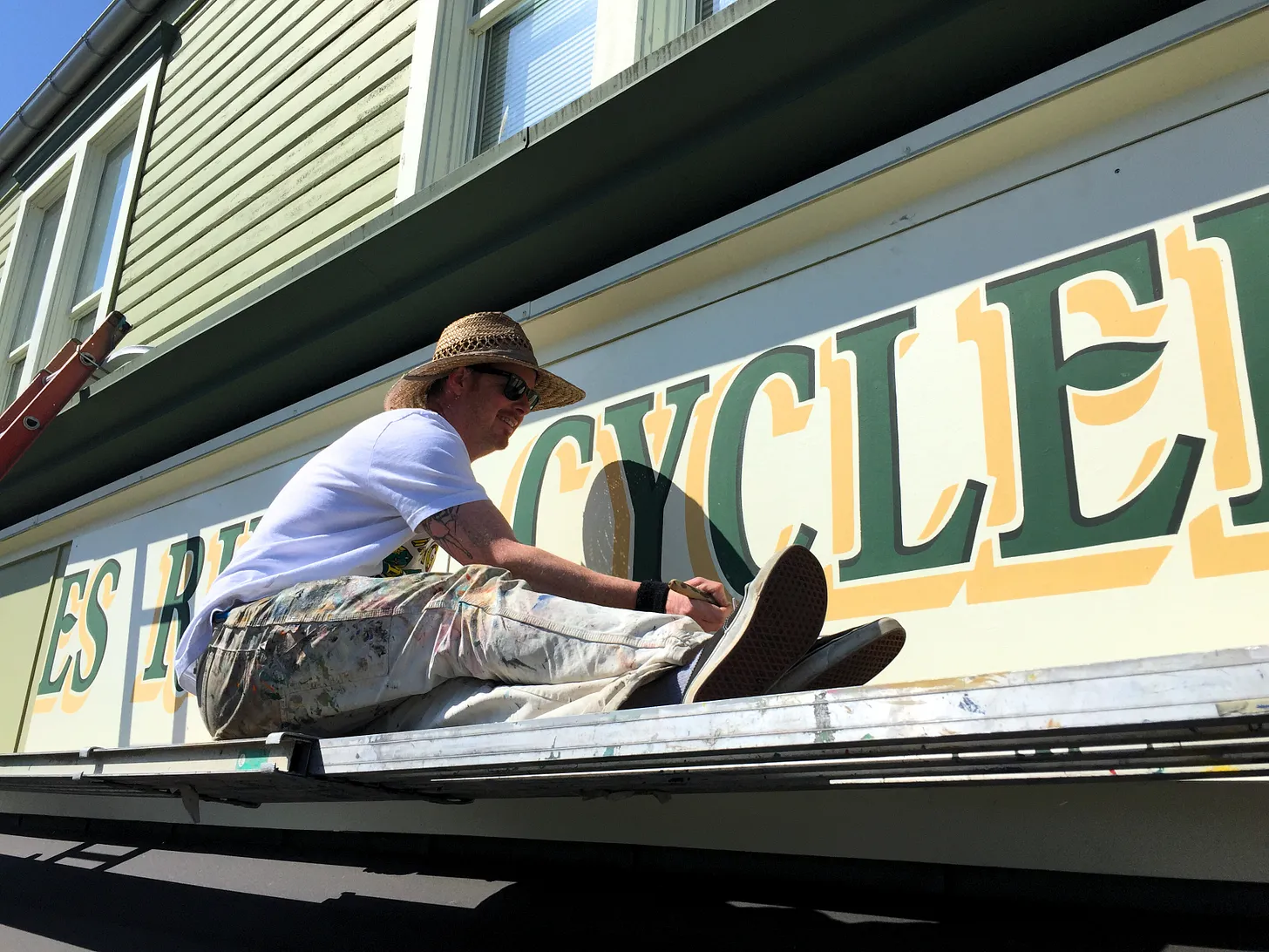 A Hand-Painted Welcome: Ira Coyne's Lasting Imprint on Olympia