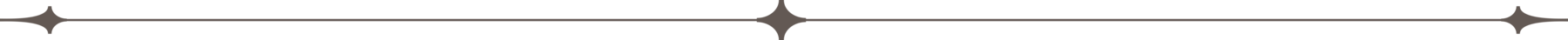 A thin horizontal line with three symmetrical starburst shapes spaced evenly along it, one in the center and one at each end. The background is light gray.
